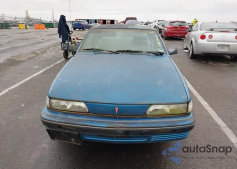 1989 Pontiac Sunbird Le из США, поврежденный, VIN 1G2JB11K2K7632386